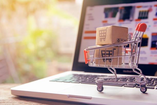 Shopping cart on a laptop keyboard